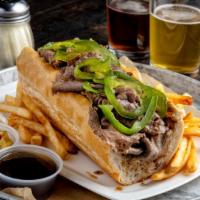 Italian Beef · Thin slices of roast beef in a spicy au jus with green peppers.