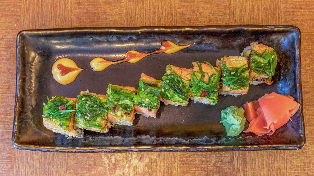 S. Red Dragon Roll (8 Pieces) · Smoke eel, avocado, inside, spicy tuna, seaweed salad on top.