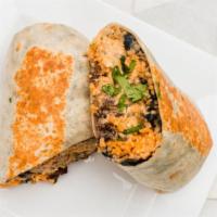 El Chupacabra · Marinated skirt steak, black beans, queso sauce, rice, fried jalapeno, cilantro