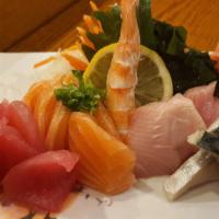 Sashimi · Chef's choice, assortment of thinly sliced fresh raw fish, served with wasabi, soy sauce, an...