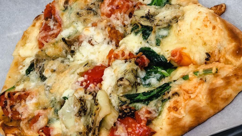 Flatbread Pizza · Vegetarian. Naan flatbread, artichoke, tomato, parmesan cheese, spinach, feta. Grilled chicken, sausage or pepperoni for an additional charge.
