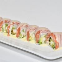 Yum Yum Roll · shrimp tempura and avocado topped with salmon and yum yum sauce