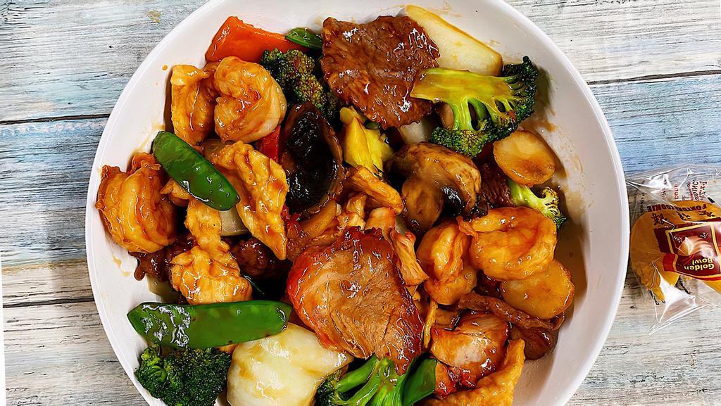 Four Seasons · Jumbo shrimp, chicken, beef, roast pork, and assorted vegetables in brown sauce.