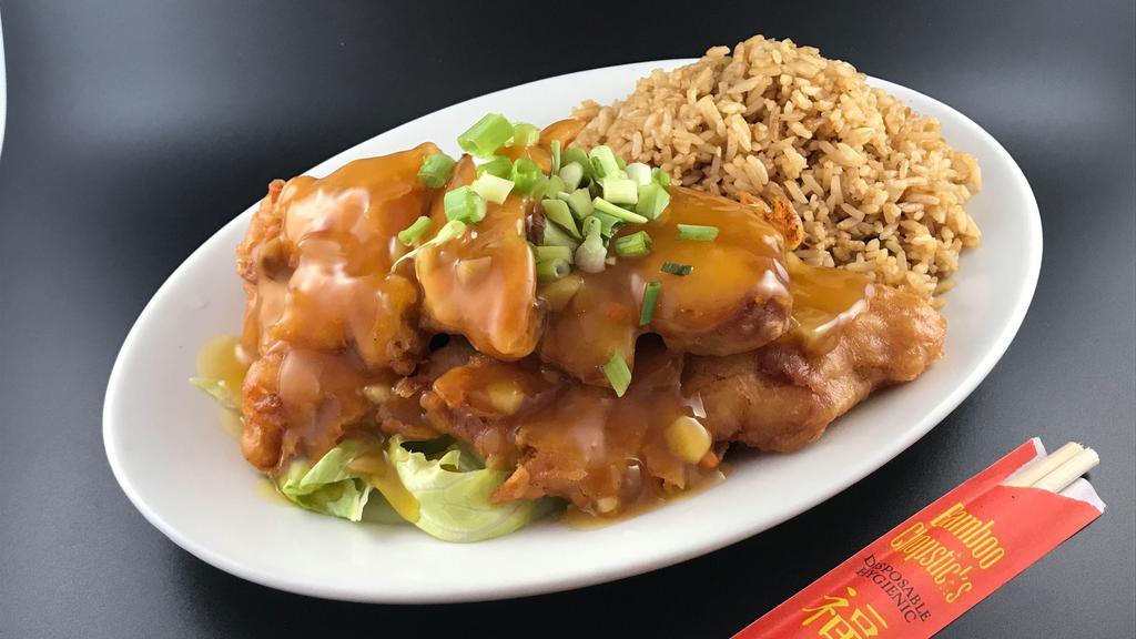 Almond Chicken  · battered and deep fried chicken breast cut into thick slices, laid on a bed of lettuce and topped with our homemade mild brown gravy and a sprinkling of green onions. Gravy contains: finely diced celery, mushroom, bamboo shoots, carrots and waterchest nuts.