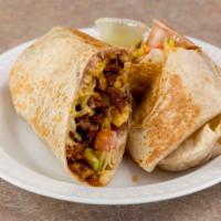 Burrito · Choice of Meat: Chicken, Steak, Ground Beef. or pork pastor (for an extra cost). Served with...