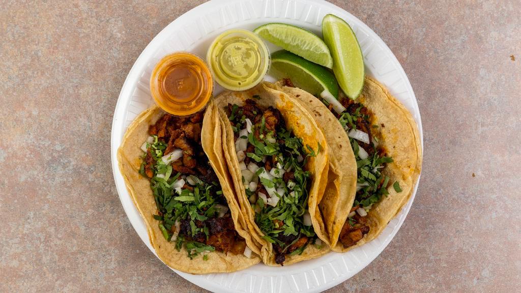 Tacos · Choice of Meat: Chicken, Steak, Ground Beef. or pork pastor (for an extra cost). Served with lettuce, tomato, onions and cilantro.