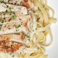 Chicken Alfredo · Traditional Alfredo sauce tossed with grilled chicken and fettuccine.