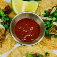 Street Tacos · (3) Tacos - your choice of protein, onions + cilantro with choice of salsa. Served with a si...
