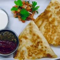 Meat + Cheese Quesadilla · Grilled tortilla filled with your choice of protein + mozzarella cheese with choice of salsa...
