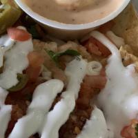 Cinco Nachos · Nachos topped with seasoned ground beef, queso cheese sauce, sour cream, pico, jalapeño and ...