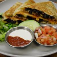 Black Bean Quesadilla · Grilled tortilla filled with mozzarella cheese, black beans, onion + cilantro with choice of...