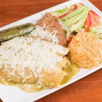 Enchiladas · (3) Corn tortillas stuffed with your choice. Topped with red, green or ranchero sauce. Serve...