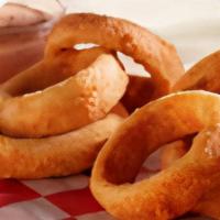Hand Breaded Onion Rings · prepared fresh daily served with zesty sauce