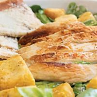 Chicken Caesar Salad · Grilled marinated chicken breast, romaine lettuce, homestyle croutons, shredded parmesan che...