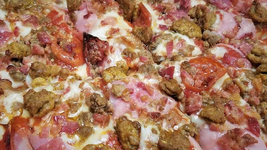 Ultimate Meat · Pepperoni, ham, salami, bacon, beef, sausage.