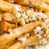 Feta Fries · Crispy french fries topped with feta cheese and parsley.