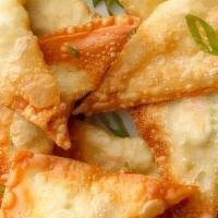 Crispy Crab Rangoon (6 Pieces) · Wontons filled with crab meat, cream cheese & scallions, served with sweet & sour sauce.