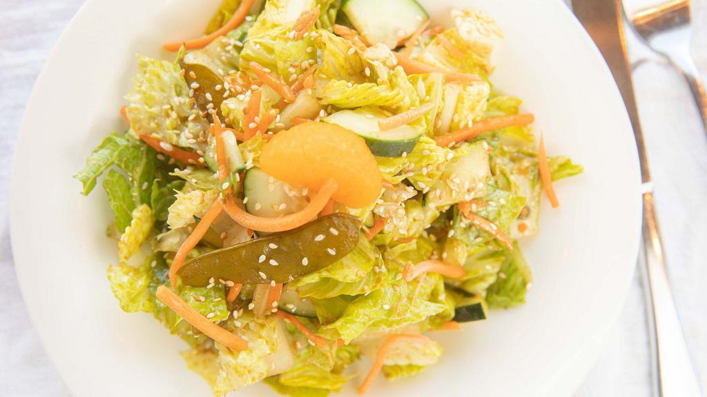 Large Zen Garden Salad · Romaine Hearts / Mandarin Oranges / Green Onions / Toasted Sesame Seeds / Cucumbers / Carrots / Snow Peas / Ginger Soy Vinaigrette
