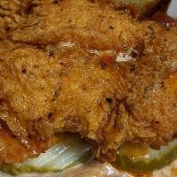 Breaded Chicken Sandwich · Crispy hand-breaded Chicken Breast fried to 
perfection topped with Lettuce, Tomato, Onion, ...