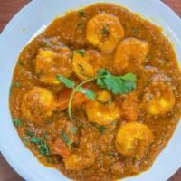 Shrimp Curry · Fried shrimp with onion and gravy and tomato.