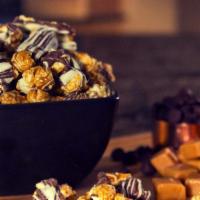 Caramel Chocolate Swirl Popcorn · Vic's own special recipe caramel, drenched over the gourmet white popcorn and punctuated wit...