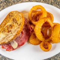 Reuben Omelet · Sliced corned beef, Swiss cheese and sauerkraut. Served with toast. Choice of potato.