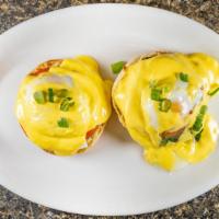 Egg Benedict · Poached egg topped with hollandaise on an English.

Consuming raw or undercooked meats, poul...
