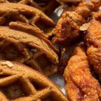 Crispy Chicken & Gingerbread Waffles · Crispy chicken tenders, gingerbread waffle, honey sriracha, and 100% pure Michigan maple syr...