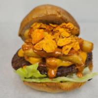 Nacho Burger · Quarter pound beef, tomato, fries, Doritos, nacho cheese, jalapeño, lettuce, chipotle sauce.