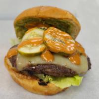 Mexican Burger · Quarter pound beef, avocado, pico de gallo cheese, chipotle sauce gallo, jalapeño, pickles, ...