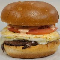 Breakfast Burger · Quarter pound beef, organic fried egg, Swiss cheese, grilled onions, grilled pepper, tomato,...