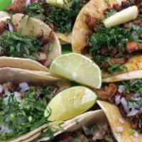 Taco · Most popular. Topped with onion and cilantro.