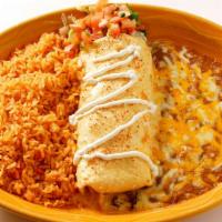 Shredded Beef Burrito · Slow-roasted chuck roast, caramelized onions, Anaheim chili sauce, and pepper jack cheese. G...