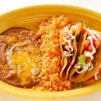 Yucatan Tacos · Three crispy tacos filled with jalapeño-marinated shredded beef, cilantro, and jalapeño topp...