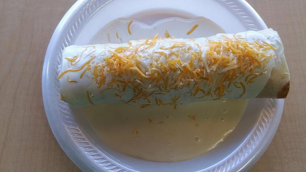 Texas Burrito · Chicken, potato, cheese, sour cream.