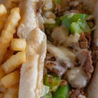 Philly Steak · Beef, steak or chicken, sautéed onions, green peppers and Swiss cheese.