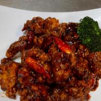 Orange Chicken Combination Plate · Hot and spicy. Served with Shrimp Fried Rice & Egg Roll.