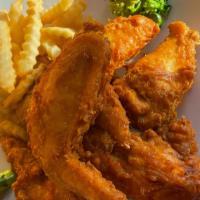 Chicken Wing · Chicken wings tossed in seasoning & batter. Lightly sauced