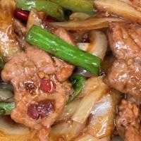 Mongolian Beef · Hot and spicy. Sautéed beef with green onion, and spinach onions.