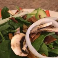 Spinach Salad · Fresh spinach leaves, bacon bits, mushrooms, cucumbers, tomatoes and hard-boiled egg all tos...