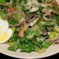 Caesar Salad · Vegetarian. Fresh Romaine, Parmesan, black olives and croutons tossed with Caesar dressing a...