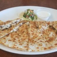 Big Quesadilla · Flour tortilla filled with cheese and choice of meat. Served with lettuce, pico de gallo and...