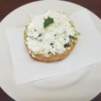 Sopes · Homemade sope Served with beans, choice of meat, lettuce,  fresh cheese and sour cream.