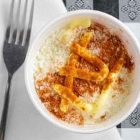 Elote En Vaso · Corn in a cup. Served with mayo, cheese, spread, lime and chili powder.