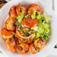Camarones A La Plancha · Grilled butterfly shrimp served with guacamole, Mexican rice, mix vegetable and salad.