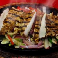 Lunch Fajita Salad · Choice of beef or chicken fajita on bed of shredded lettuce, with bell peppers, red onions, ...
