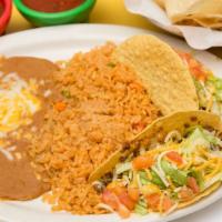 Crispy Tacos · Two tacos with your choice of shredded beef or chicken, carnitas or ground beef topped with ...