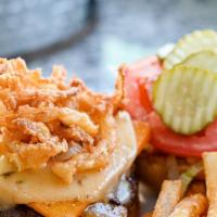 Cajun Country Burger · Fresh Burger Pattie, Cajun Onions, Combination of Cheddar & Pepper Jack Cheese, Onion Straws...