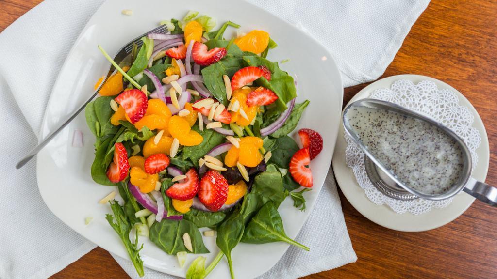 Orange Strawberry · mixed greens, mandarin oranges, strawberries, celery, red onions, toasted almonds, poppy seed dressing