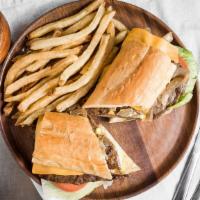 Prime Rib Sandwich · Lettuce, tomatoes, onion, grill onions, mayo, mustard, American cheese